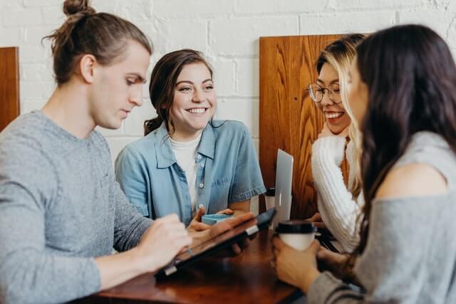 A group of young adults networking